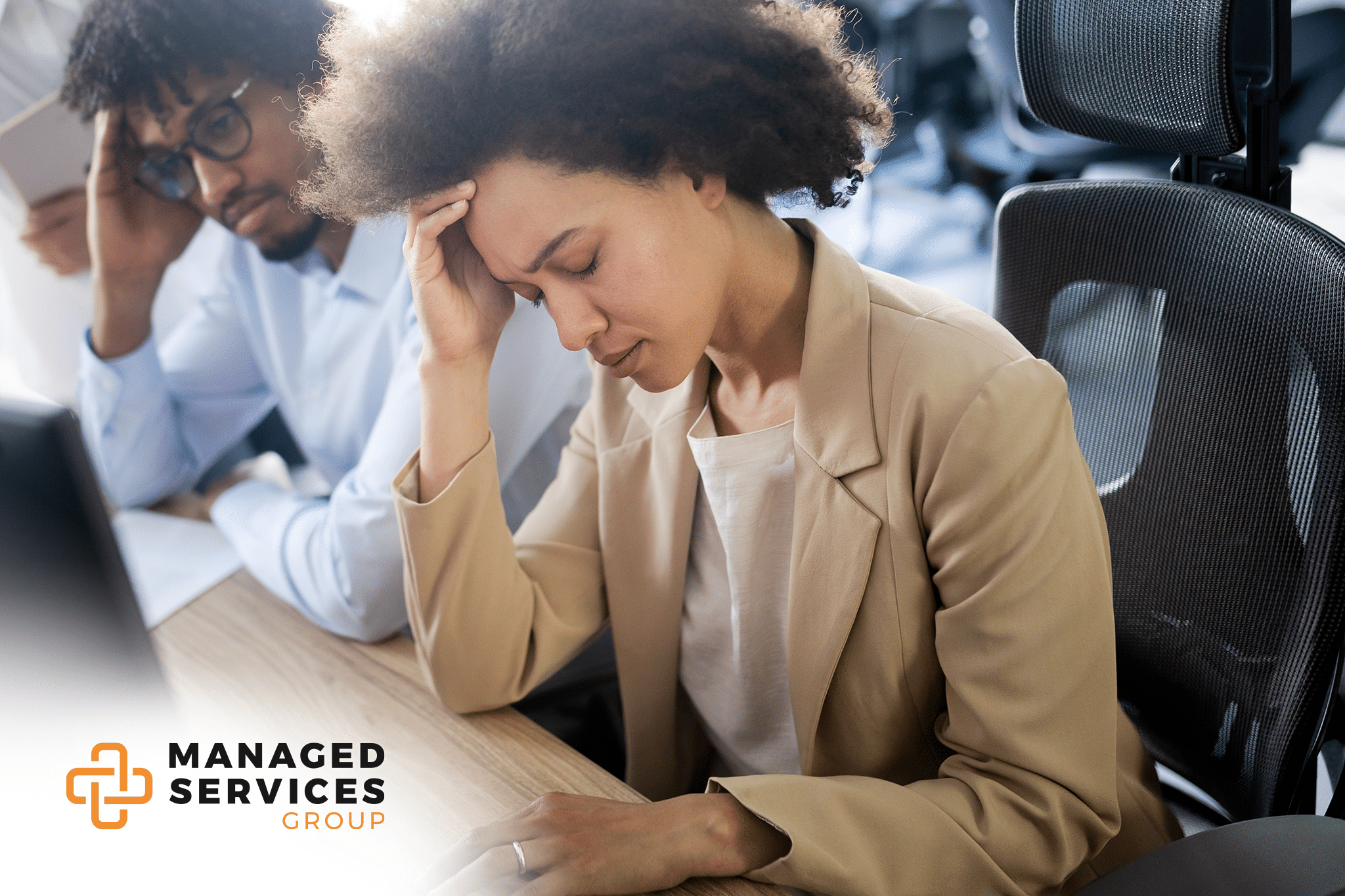 Managed Services Group - Team frustrated at desk