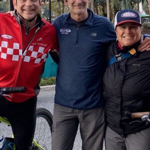 Team smiling while outdoors