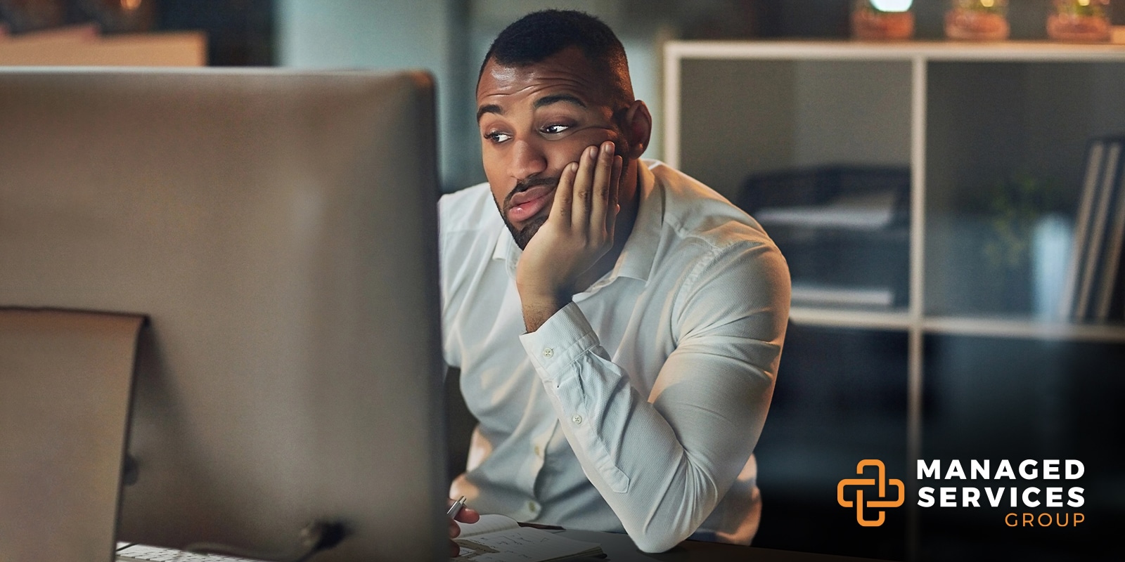 Managed Services Group - Man frustrated at home computer