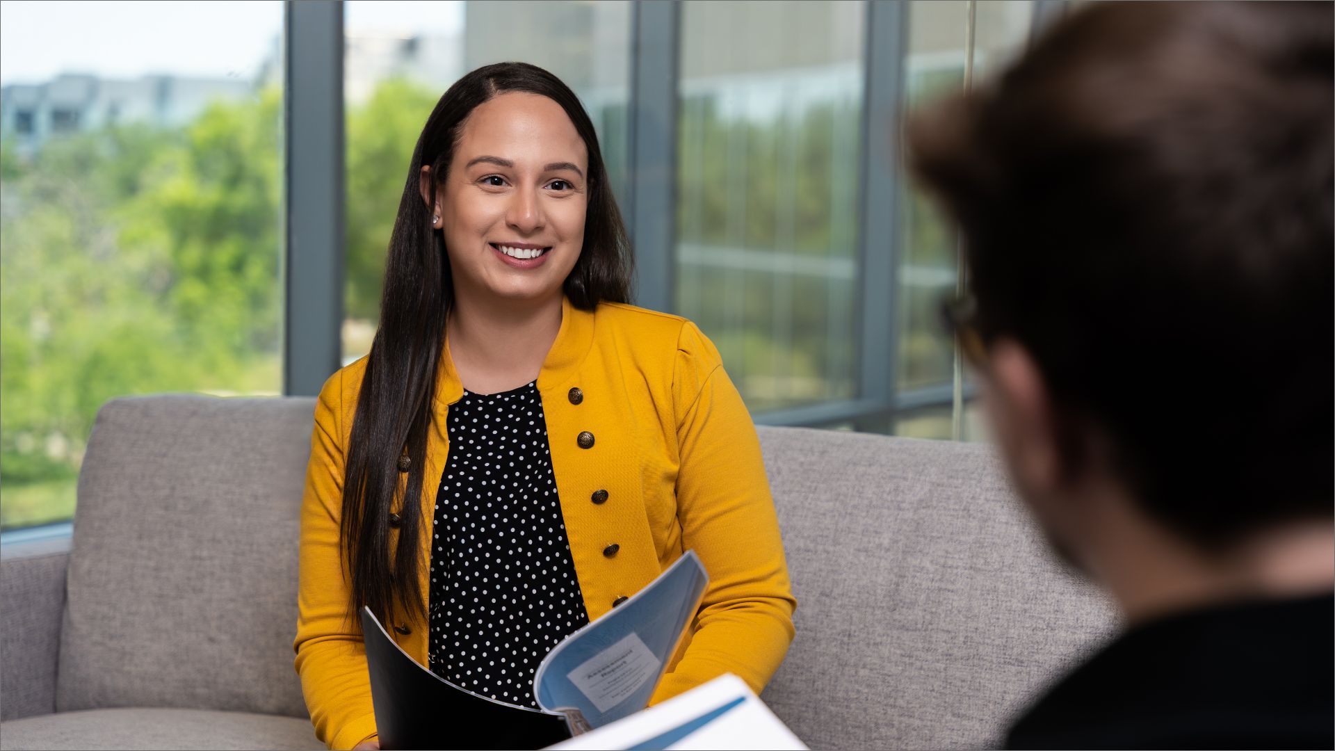 smiling during client meeting