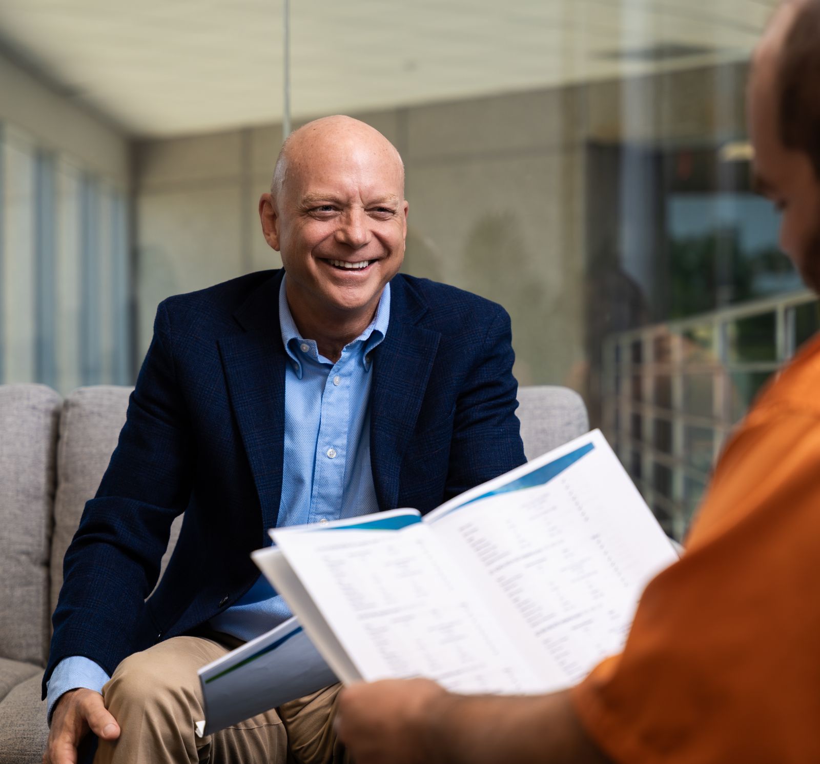 smiling while reviewing summary